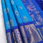 Peacock Blue Silk Saree with Royal Blue Border & Floral Zari Weaving