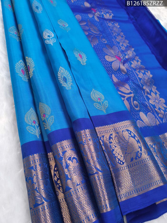 Peacock Blue Silk Saree with Royal Blue Border & Floral Zari Weaving - Image 1