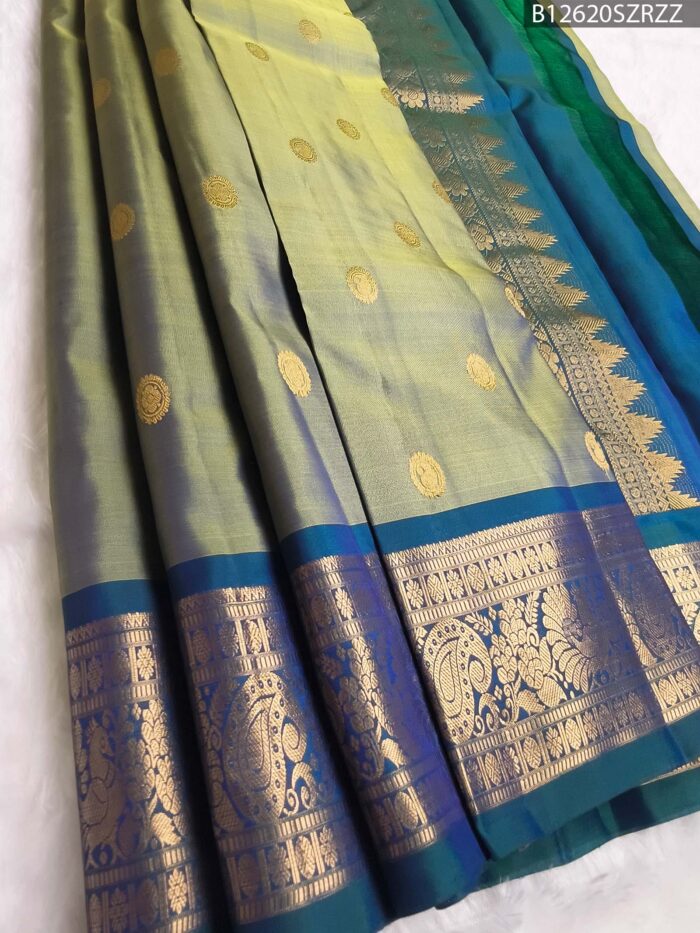 B12620 F #SZRZZ Olive Green to Peacock Blue Dual Tone Pure Silk Saree with Traditional Zari Border - Image 1