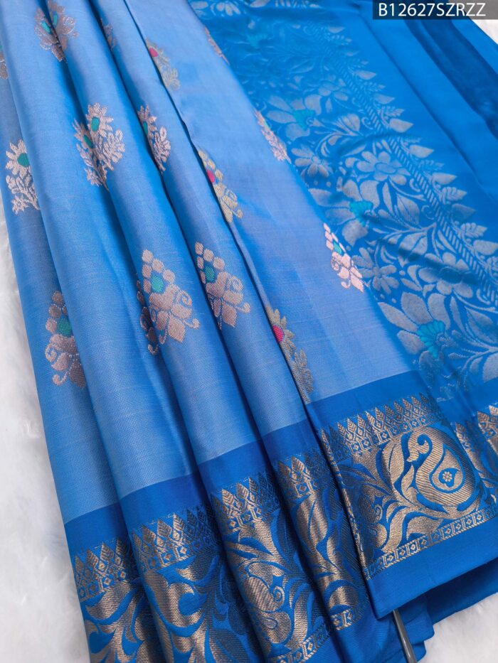 Sky Blue Soft Silk Saree with Multicolor Floral Motifs & Royal Blue Zari Border - Image 1
