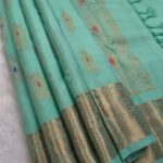 Pastel Green Soft Silk Saree with Golden Zari and Multi-Color Butta Design