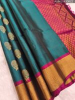 Elegant Teal Silk Saree with Rich Magenta Pallu and Intricate Border