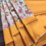 Pastel Blue Coloured Fancy Silk Saree with Floral Motifs and Contrast Border