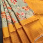 Pastel Green Coloured Fancy Silk Saree with Floral Motifs and Rich Pallu