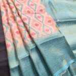 Aqua and Peach Coloured Fancy Silk Saree with Ikat Motifs and Intricate Border