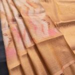 Golden Coloured Fancy Silk Saree with Ethereal Body and Elegant Zari Woven Border