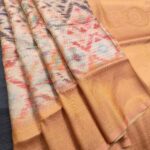 Peach Coloured Fancy Silk Saree with Ikat Pattern and Intricate Zari Woven Border