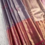 Lavender Coloured Tissue Saree with Floral Motifs and Rich Zari Woven Border