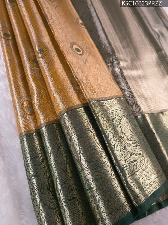 Gold Coloured Tissue Silk Saree with Peacock Motifs and Rich Zari Border - Image 1