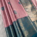 Pink Coloured Tissue Silk Saree with Floral Motifs and Rich Zari Woven Border