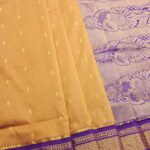 Golden Blended Soft Silk Saree with Subtle Buttas and Rich Purple Brocade Pallu