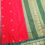 Red Blended Soft Silk Saree with Floral Motifs and Rich Green Zari Woven Pallu and Border