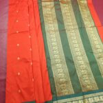 Orange Blended Soft Silk Saree with Floral Motifs and Rich Green Zari Pallu and Border