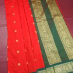 Vibrant Red Blended Soft Silk Saree with Floral Motifs and Rich Zari Green Pallu