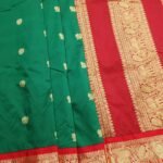Green Blended Soft Silk Saree with Floral Motifs and Rich Zari Border