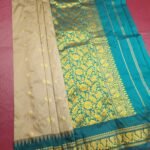 Beige and Teal Blended Soft Silk Saree with Floral Zari Brocade and Temple Design Border