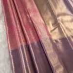 Pink and Gold Tissue Saree with Floral Motifs and Rich Zari Border