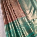 Peach and Aqua Coloured Tissue Saree with Intricate Brocade and Zari Woven Border