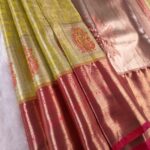 Lime Green and Gold Tissue Saree with Intricate Paisley Motifs and Rich Zari Border