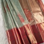 Sage Green and Gold Tissue Saree with Floral Motifs and Rich Zari Border