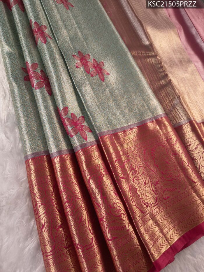 Pastel Green Tissue Saree with Floral Motifs and Rich Zari Woven Border - Image 1