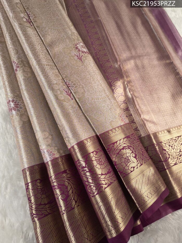 KSC21953_MAIN #PRZZ Beige Coloured Tissue Saree with Intricate Floral Motifs and Rich Zari Border - Image 1