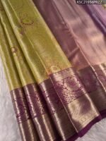 Olive Green Coloured Tissue Saree with Rich Zari Floral Motifs and Contrast Purple Border