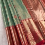 Elegant Green Tissue Saree with Intricate Zari Pallu and Rich Border