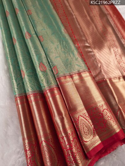 Elegant Green Tissue Saree with Intricate Zari Pallu and Rich Border