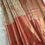 Beige and Rust Coloured Tissue Saree with Floral Brocade and Rich Zari Pallu