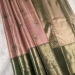 Pink Coloured Tissue Silk Saree with Peacock Motifs and Rich Zari Border