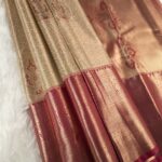 Beige Coloured Tissue Silk Saree with Rich Paisley Motifs and Zari Woven Border