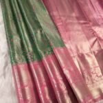 Green and Pink Tissue Saree with Floral Motifs and Rich Zari Border