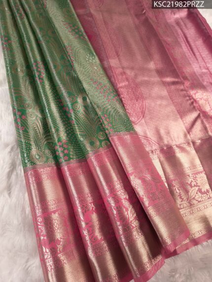 Green and Pink Tissue Saree with Floral Motifs and Rich Zari Border