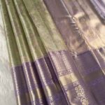 Green and Lavender Tissue Saree with Floral Motifs and Rich Zari Border