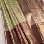 Elegant Green Tissue Saree with Paisley Motifs and Rich Zari Border