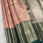 Blush Coloured Tissue Saree with Rich Floral Brocade and Zari Woven Border