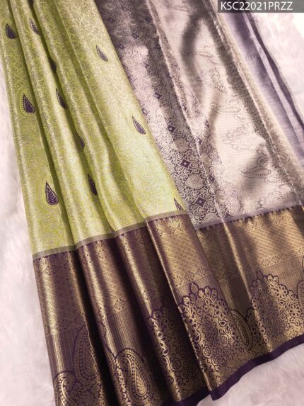 Green and Silver Tissue Saree with Paisley Motifs and Rich Zari Border