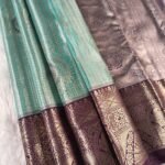 Teal Coloured Tissue Silk Saree with Floral Brocade and Rich Zari Border