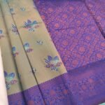 Elegant Blue and Green Fancy Saree with Beautiful Floral Motifs and Rich Border Design