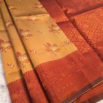 Orange and Red Printed Fancy Saree with Rich Border and Floral Pallu