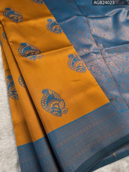 Mustard Yellow and Blue Fancy Saree with Traditional Fish Motifs and Intricate Border