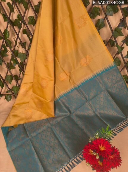 Beautiful Yellow and Teal Semi Soft Silk Saree with Floral Patterns and Designer Pallu