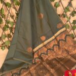 Beautiful Dark Green Semi Soft Silk Saree with Rich Golden Border and Intricate Motifs
