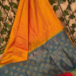Vibrant Orange and Teal Semi Soft Silk Saree with Circular Motifs and Elegant Border
