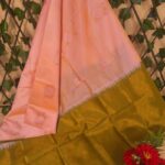 Peach and Olive Green Semi Soft Silk Saree with Floral Motifs and Elegant Border