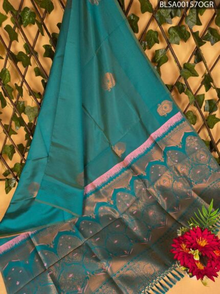 Teal Semi Soft Silk Saree with Intricate Golden Motifs and Pink Border