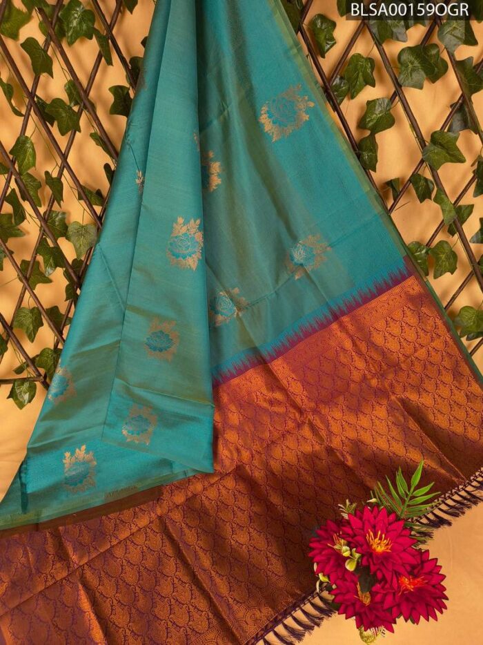 BLSA00159_MAIN_OGR-1.jpg Teal and Copper Semi Soft Silk Saree with Floral Motifs and Rich Border Design - Image 1