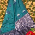 Teal Semi Soft Silk Saree with Beautiful Blue Motifs and Rich Border
