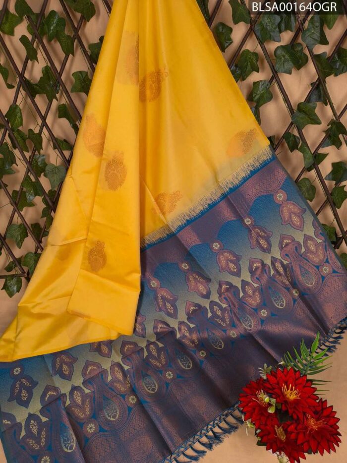 BLSA00164_MAIN_OGR-1.jpg Beautiful Yellow and Blue Semi Soft Silk Saree with Intricate Leaf Motifs and Rich Pallu Design - Image 1